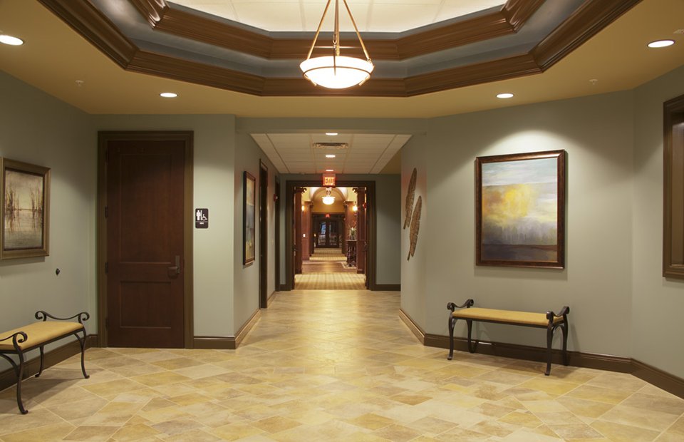 interior of a spa foyer of a club with a tiled floor