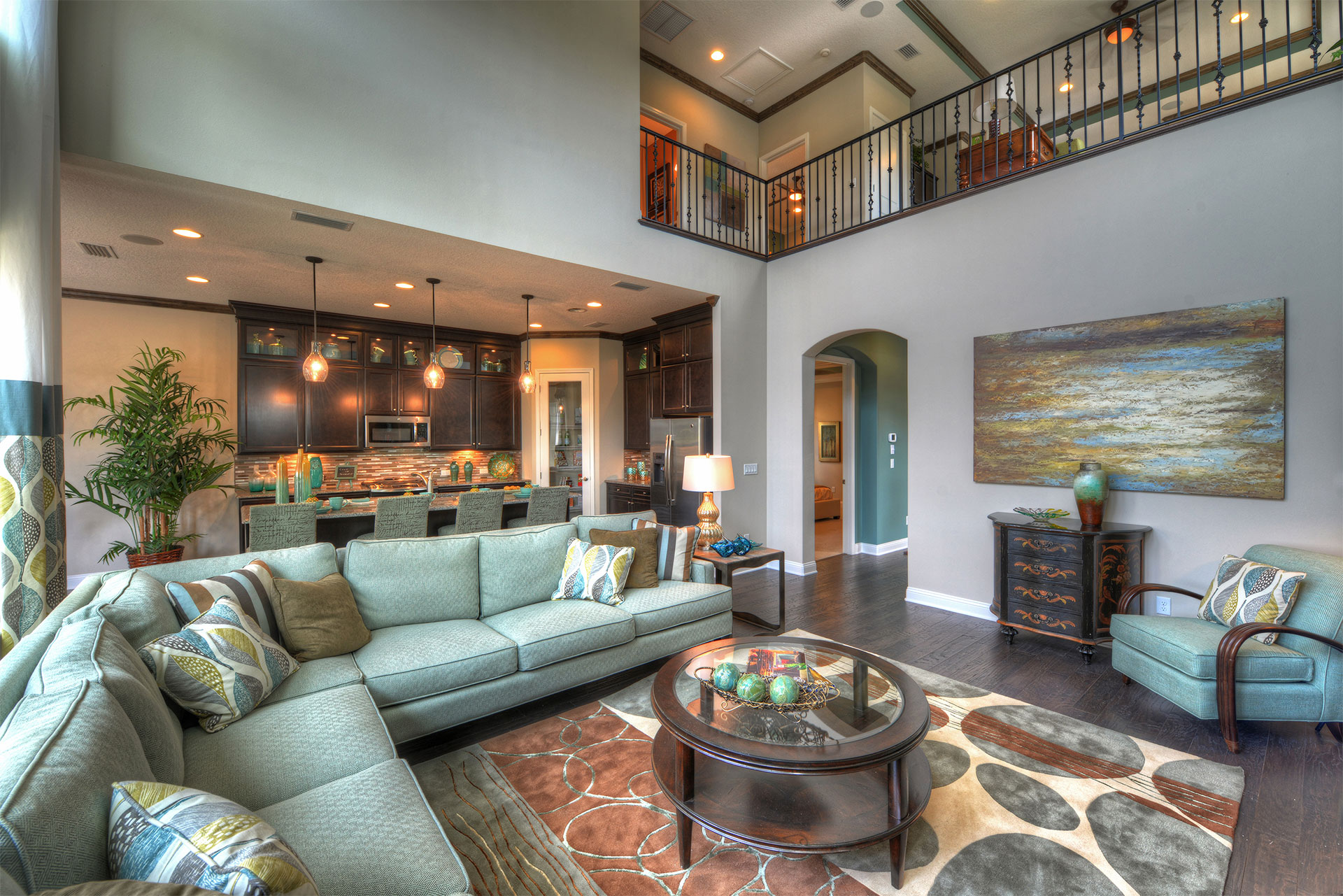 Spacious and inviting great room with contemporary design, featuring stylish furnishings and ample natural light.